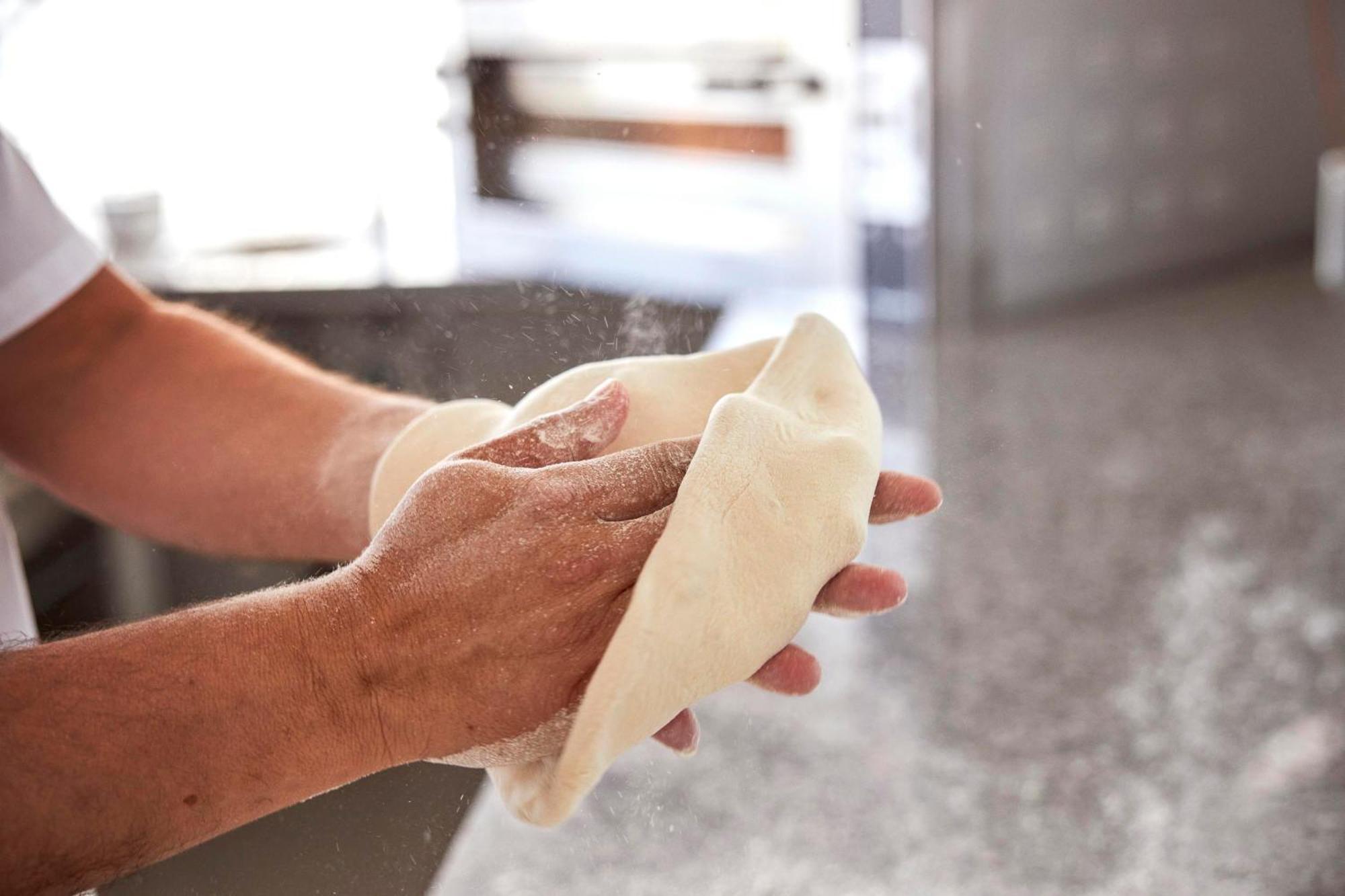 Monchique Resort & Spa Exteriér fotografie A baker kneading bread dough